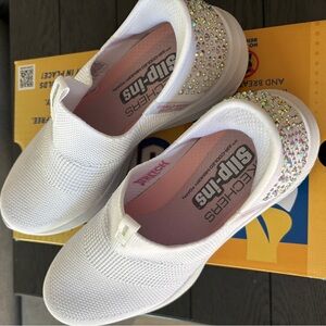 Skechers White Slip-On Sneakers with Rhinestone Accents